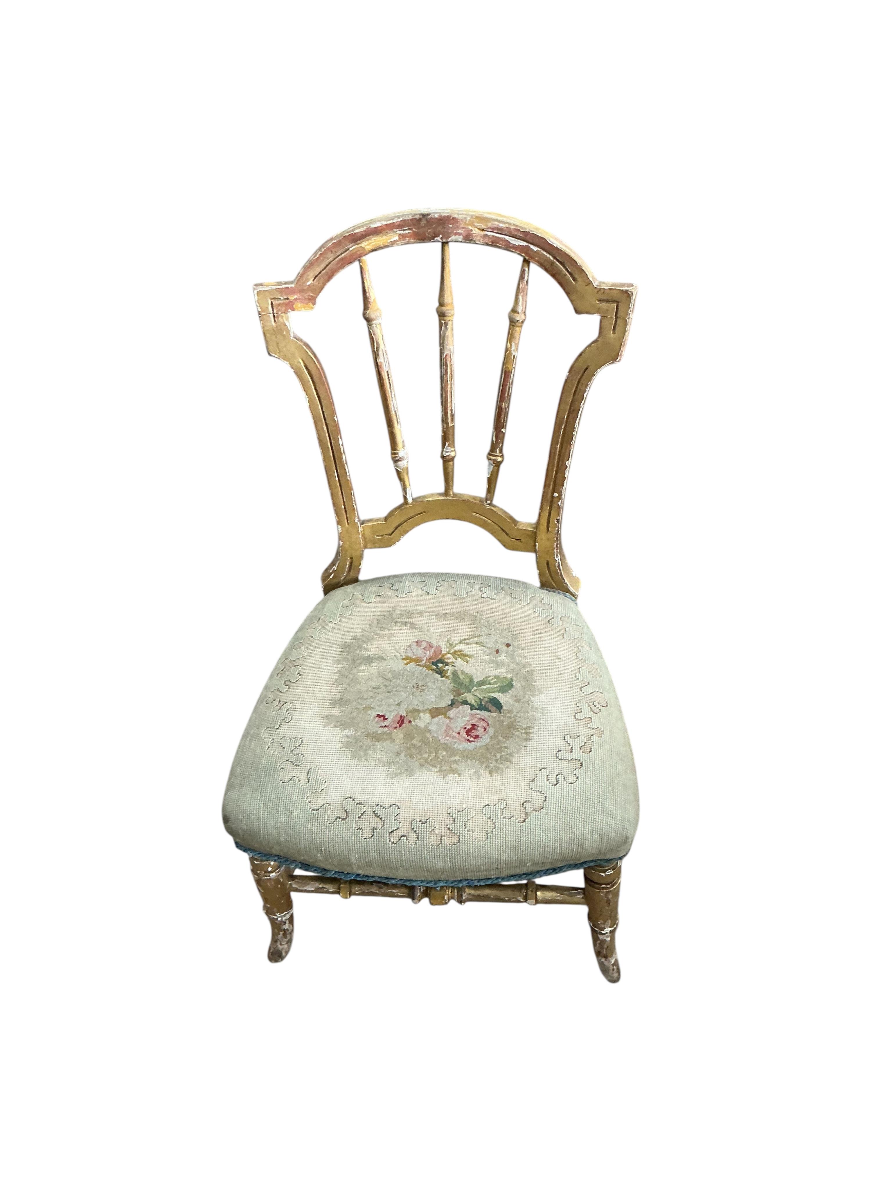 A painted George I style child's elbow chair, width 48cm, depth 33cm, height 78cm together with a giltwood child's chair with floral tapestry seat